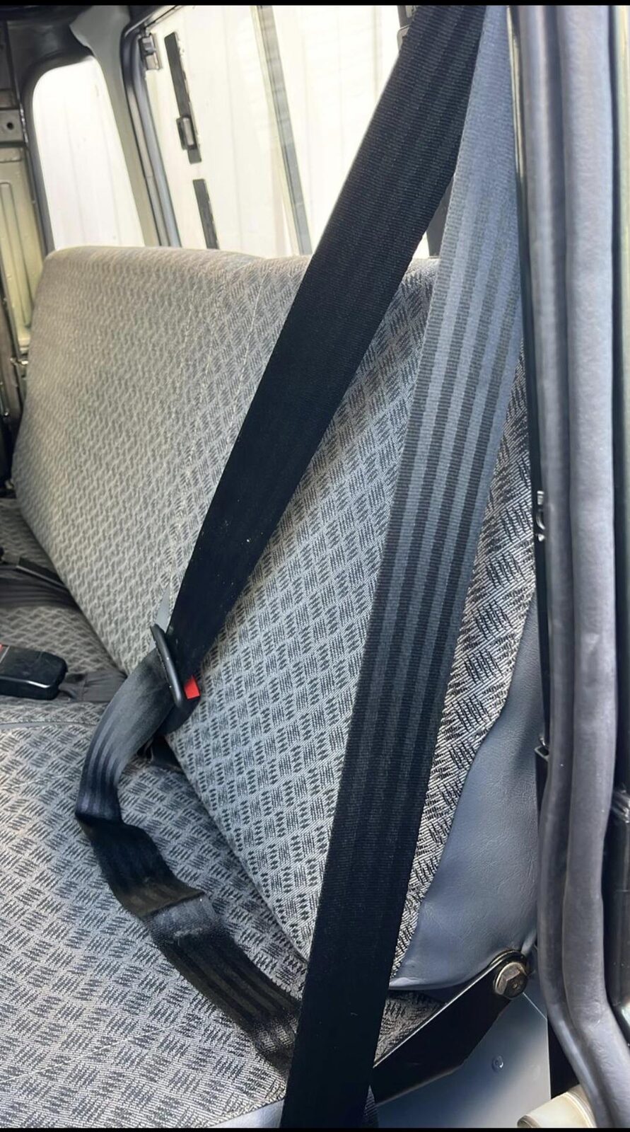 Rear bench with shoulder harness